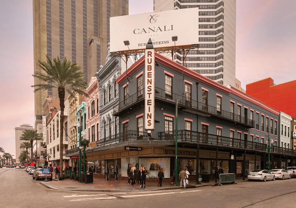 a building on the corner of a street in a city at The Rubenstein Hotel in New Orleans