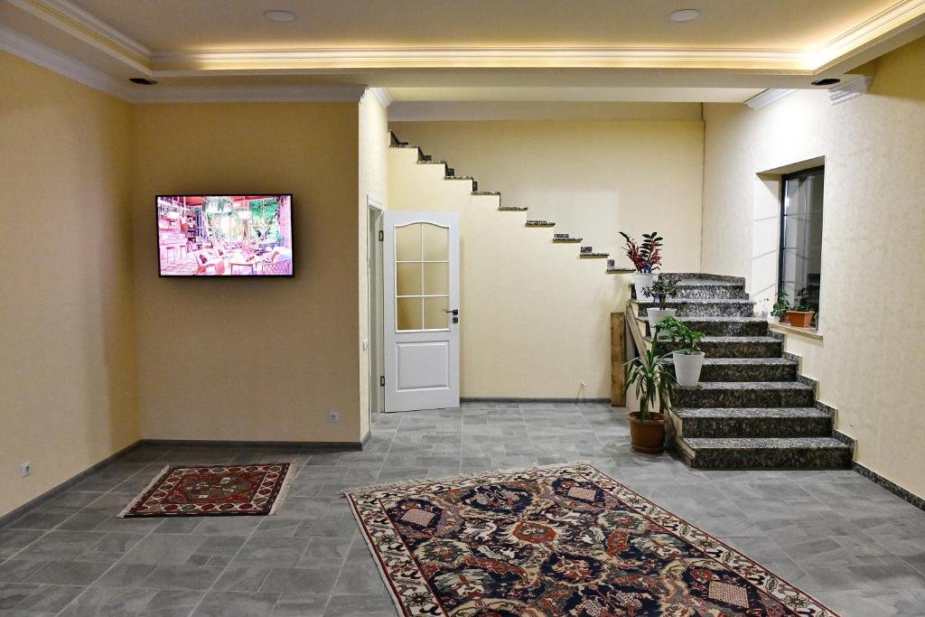 TV a/nebo společenská místnost v ubytování woolway studios