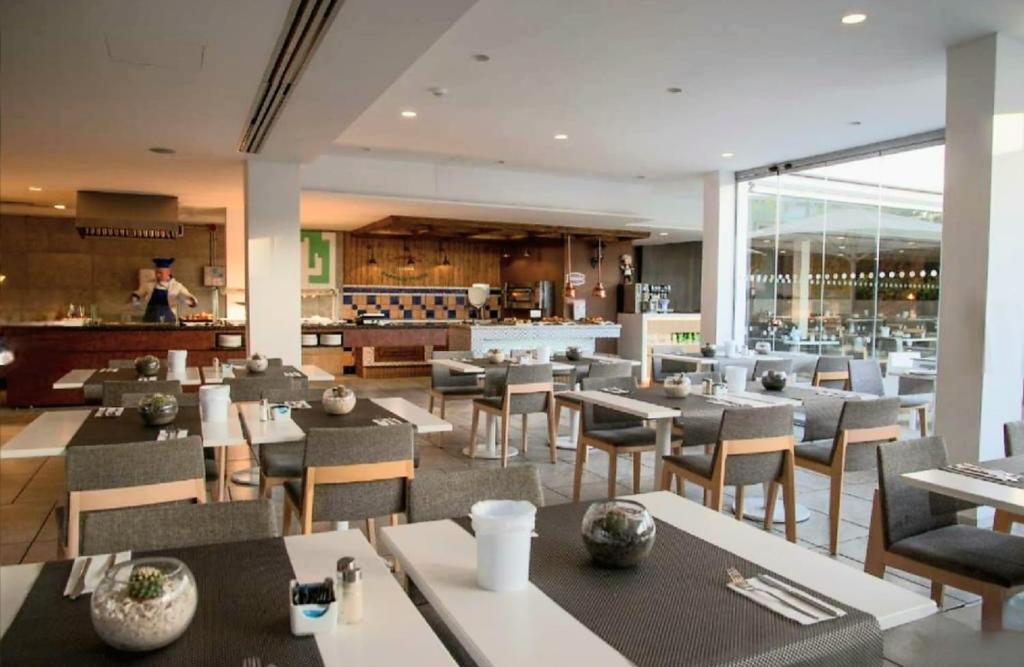 Restoran ili drugo mesto za obedovanje u objektu Luxury Apartment Playa del Inglés