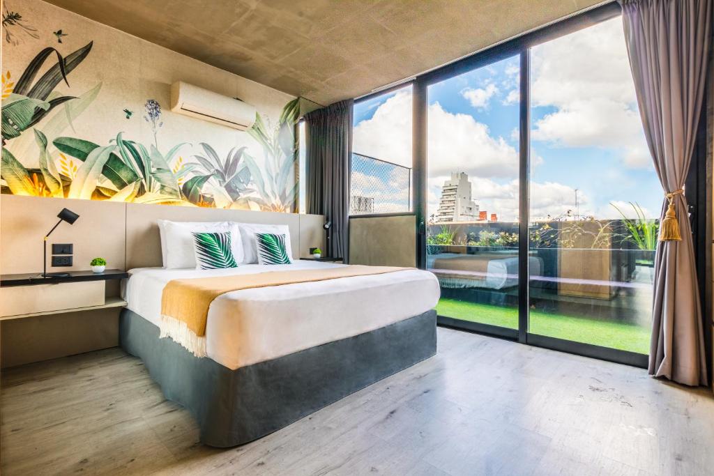 Postel nebo postele na pokoji v ubytování Deluxe Apartments in Palermo - by BueRentals