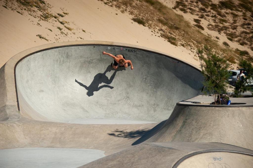 a man riding a skateboard in a skate park at Douce brise à Seignosse-2 min à pied de la plage in Seignosse