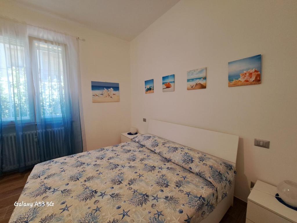 Ένα ή περισσότερα κρεβάτια σε δωμάτιο στο La casetta al mare di Bubi