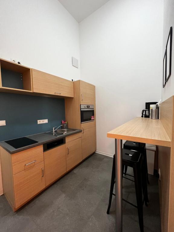 Kuchyň nebo kuchyňský kout v ubytování Fabella Flats Forchheim