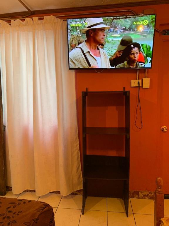 TV a/nebo společenská místnost v ubytování Residencial La Piramide