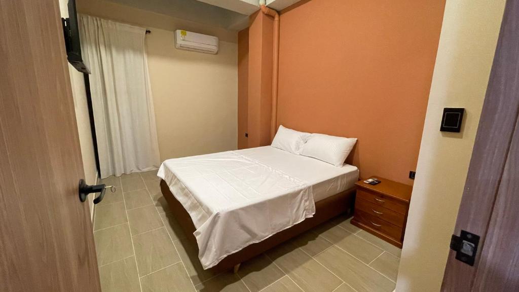 Postel nebo postele na pokoji v ubytování Awa House Hotel