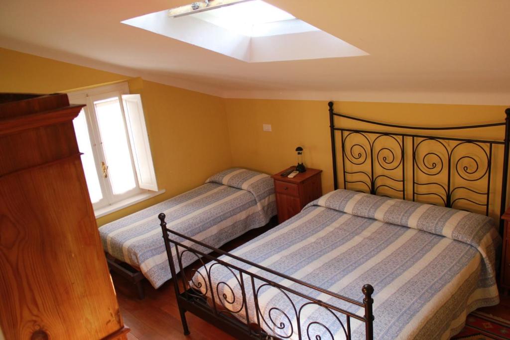 Кровать или кровати в номере B&B Al Borgo