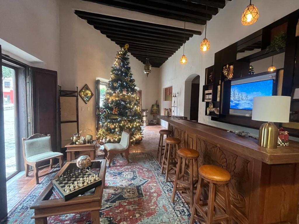 TV a/nebo společenská místnost v ubytování Hotel Casa Oratorio "Adults Only"