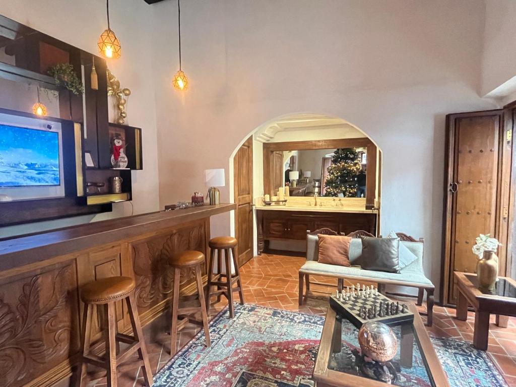 TV a/nebo společenská místnost v ubytování Hotel Casa Oratorio "Adults Only"