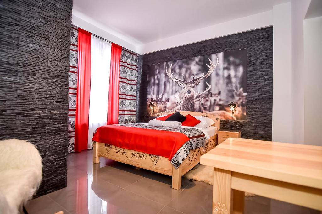 Postel nebo postele na pokoji v ubytování "CZARNA TURNIA"-Apartamenty