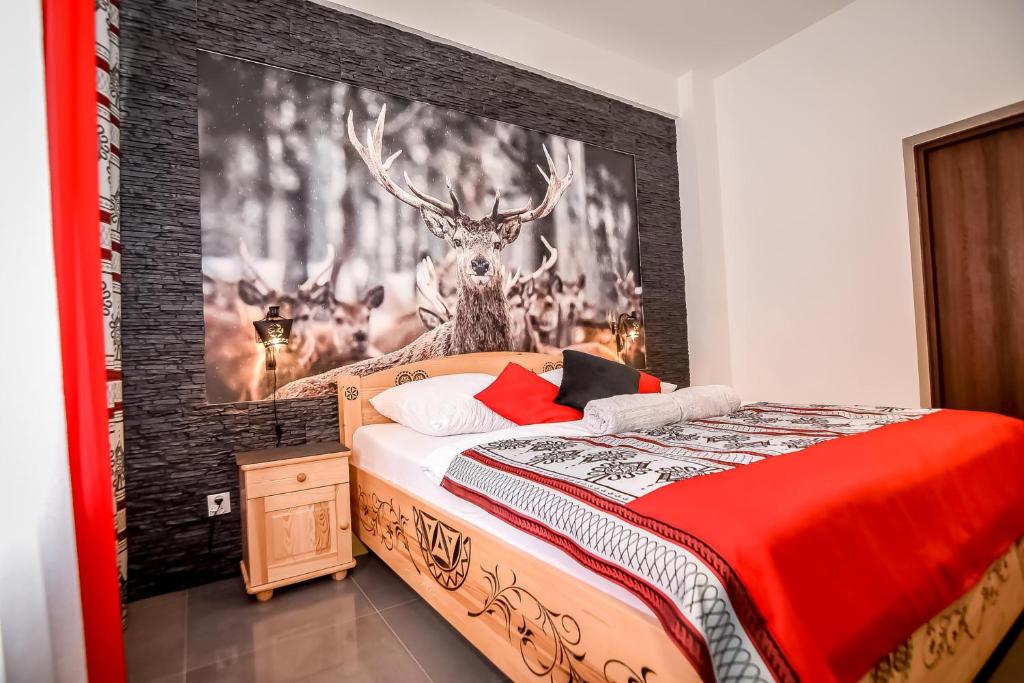 Postel nebo postele na pokoji v ubytování "CZARNA TURNIA"-Apartamenty