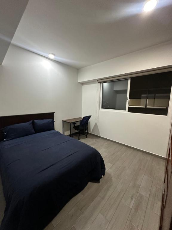 Departamento habitación privada balcón terraza tesisinde bir odada yatak veya yataklar