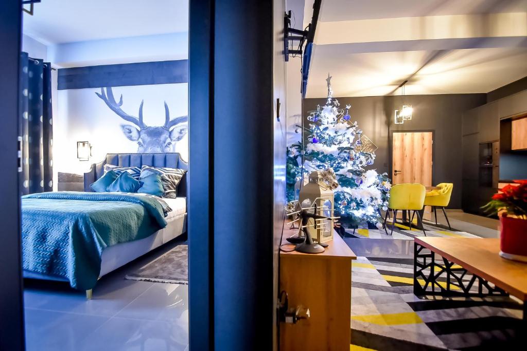 Postel nebo postele na pokoji v ubytování "CZARNA TURNIA"-Apartamenty