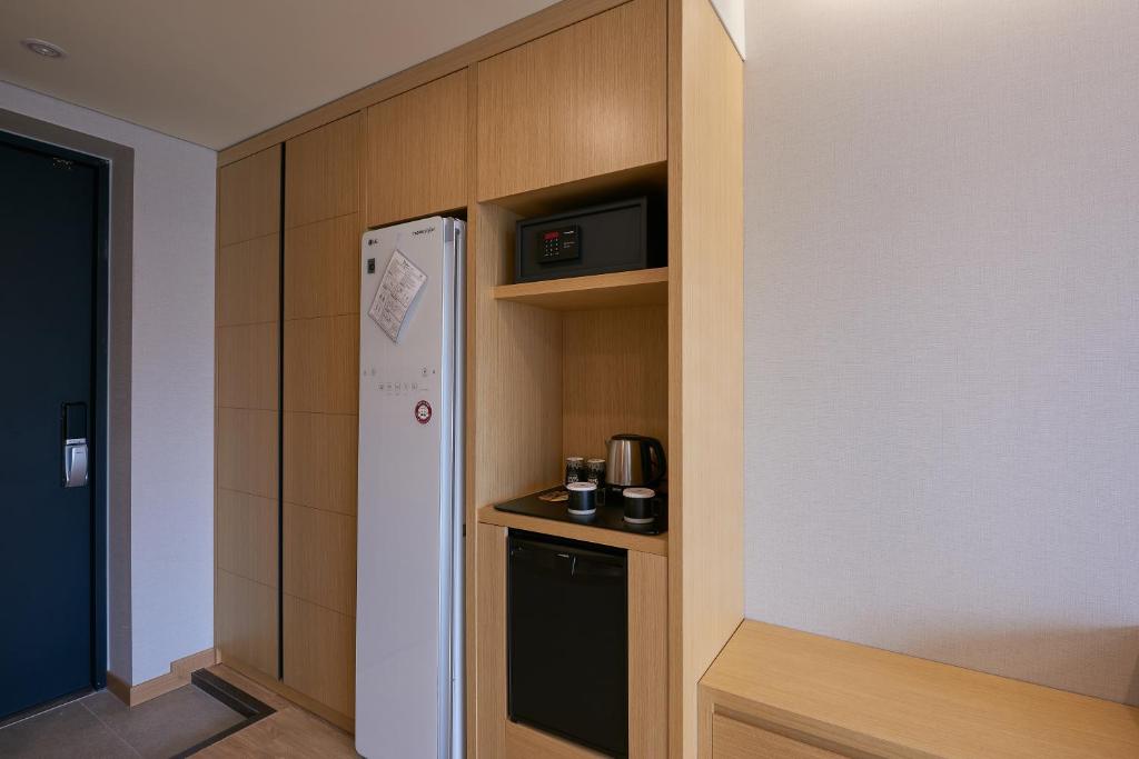 Kuchyň nebo kuchyňský kout v ubytování CS Hotel