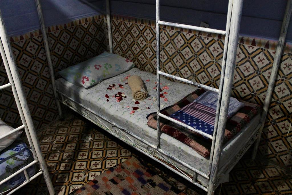 Postel nebo postele na pokoji v ubytování Hostel kif kif annex