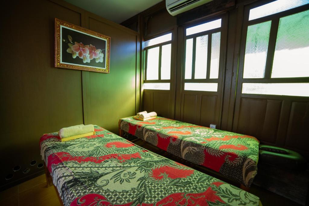 Postel nebo postele na pokoji v ubytování Pertiwi Bisma Ubud