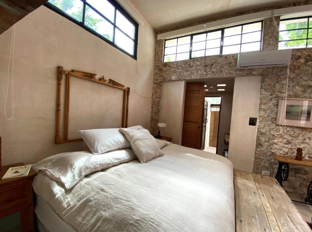 Postel nebo postele na pokoji v ubytování Casa de la Luz