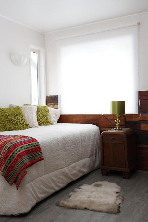 Postel nebo postele na pokoji v ubytování Apart Hotel Bianco