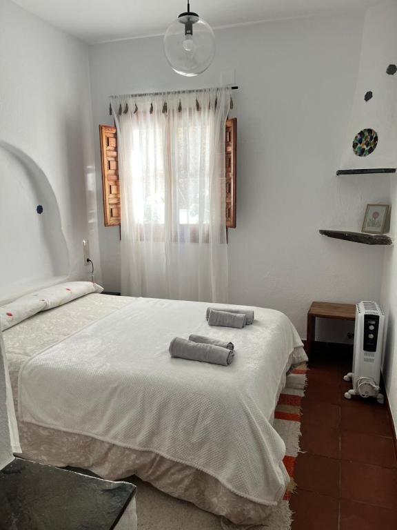 Postel nebo postele na pokoji v ubytování Slow house