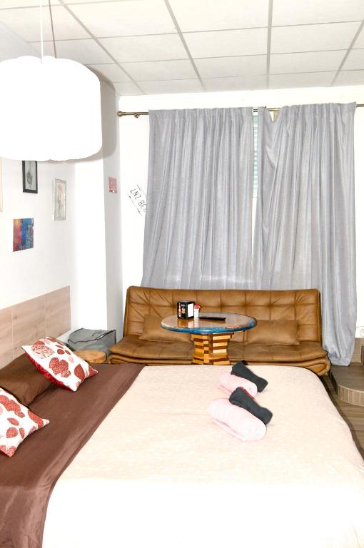Postel nebo postele na pokoji v ubytování Calpe loft Suite Zendra