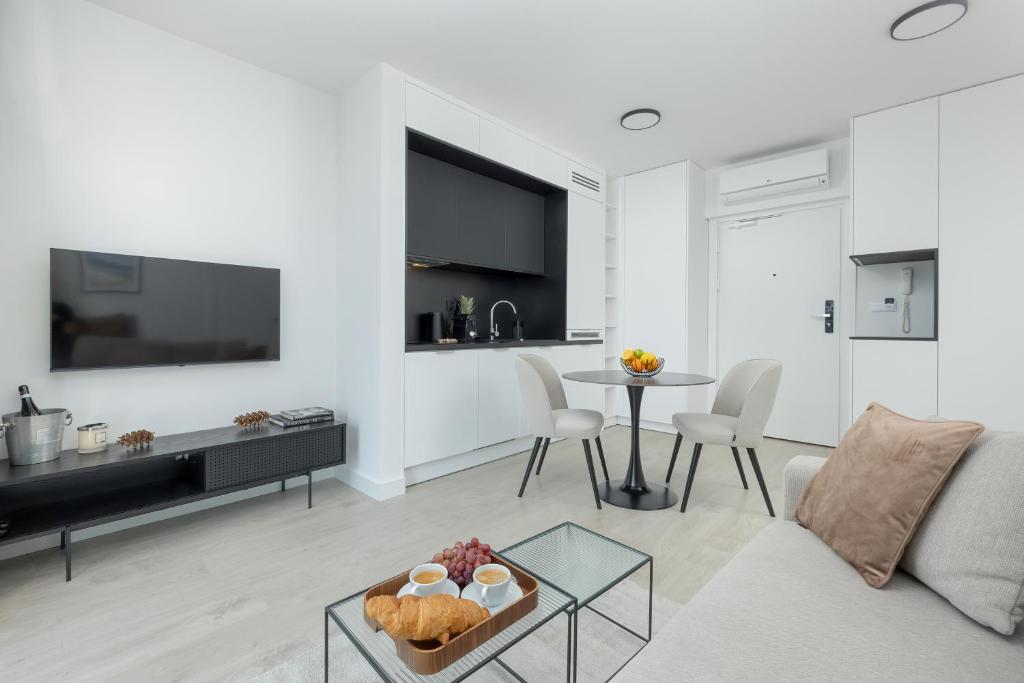 TV a/nebo společenská místnost v ubytování Wave by Baltic Home