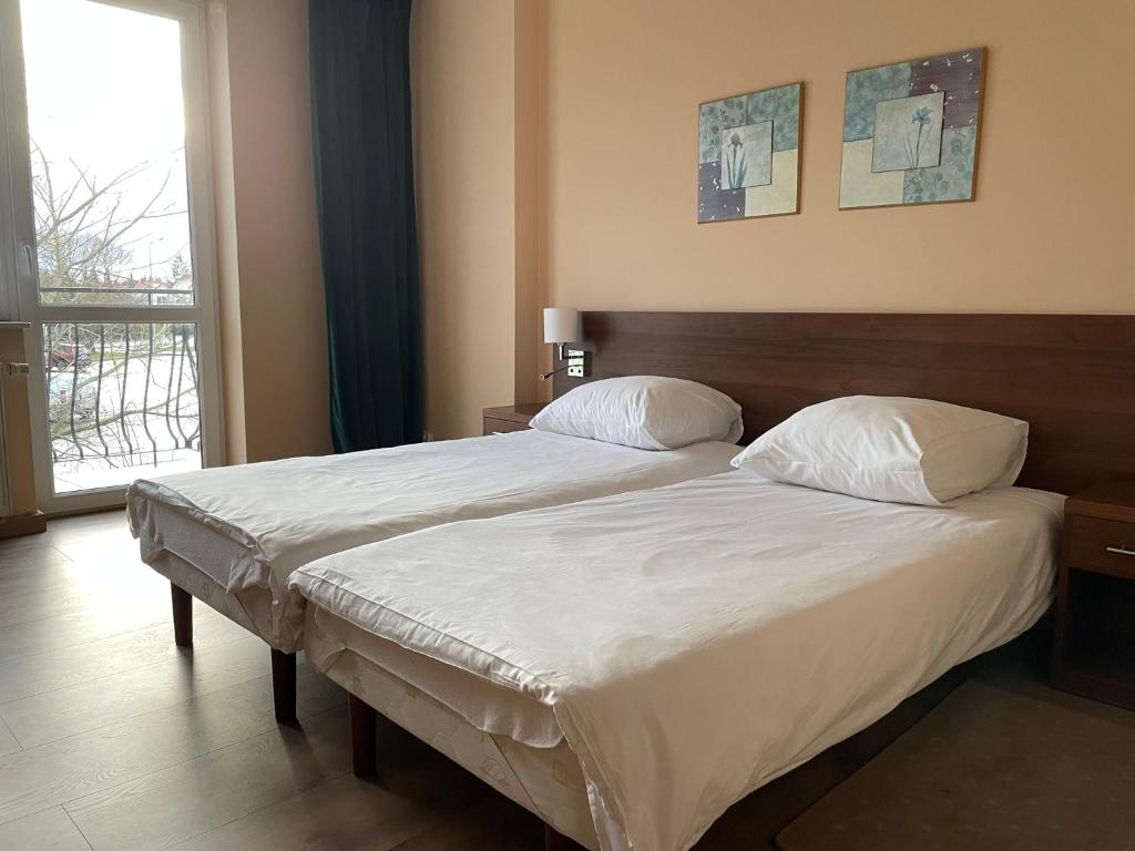 Postel nebo postele na pokoji v ubytování Motel Pieprzyk