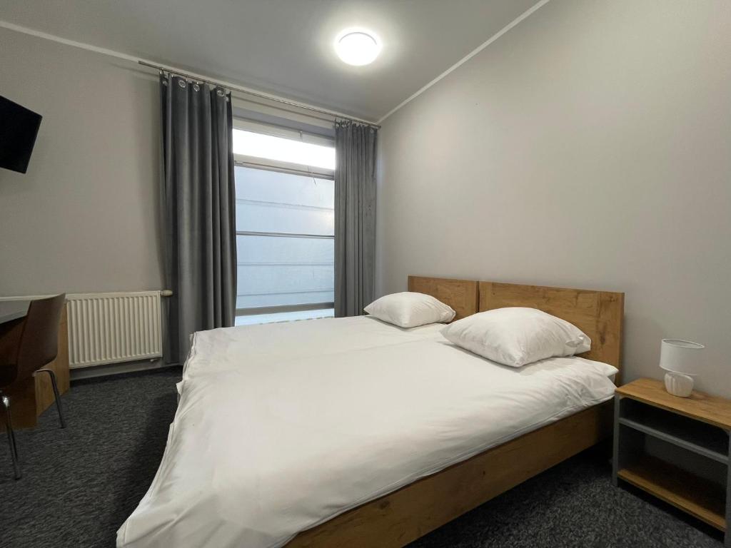Postel nebo postele na pokoji v ubytování Motel Pieprzyk