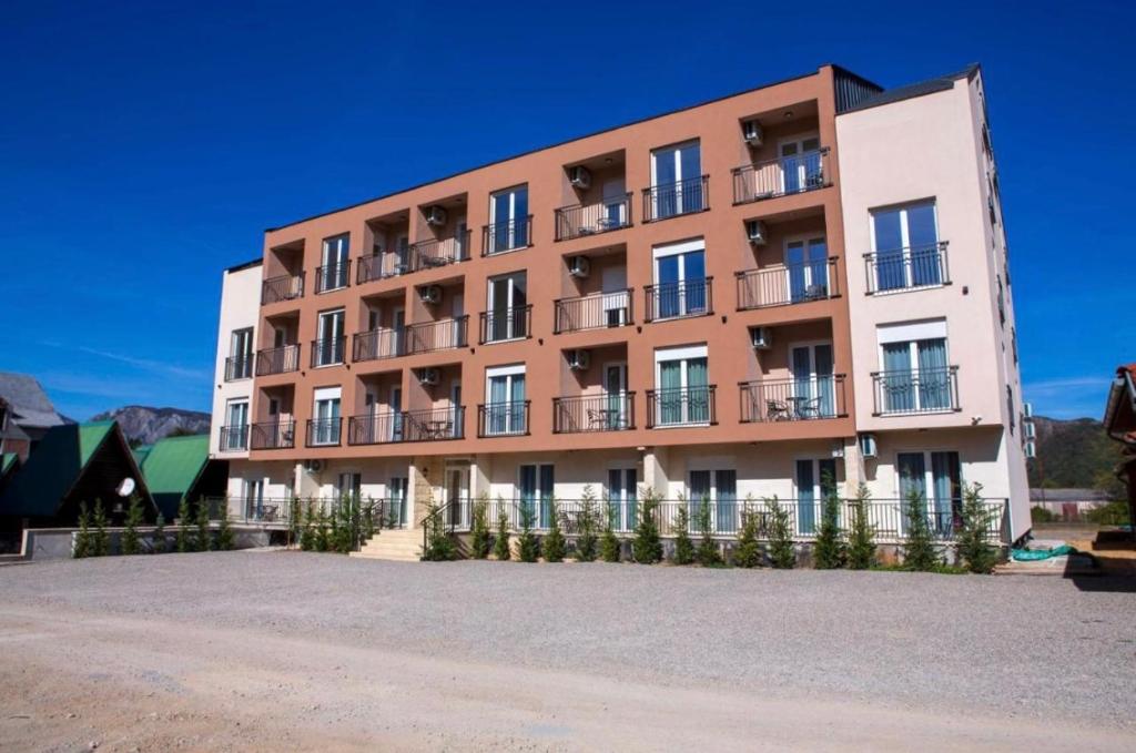 a building with balconies on the side of it at Stasa_cozy_nest in Kolašin