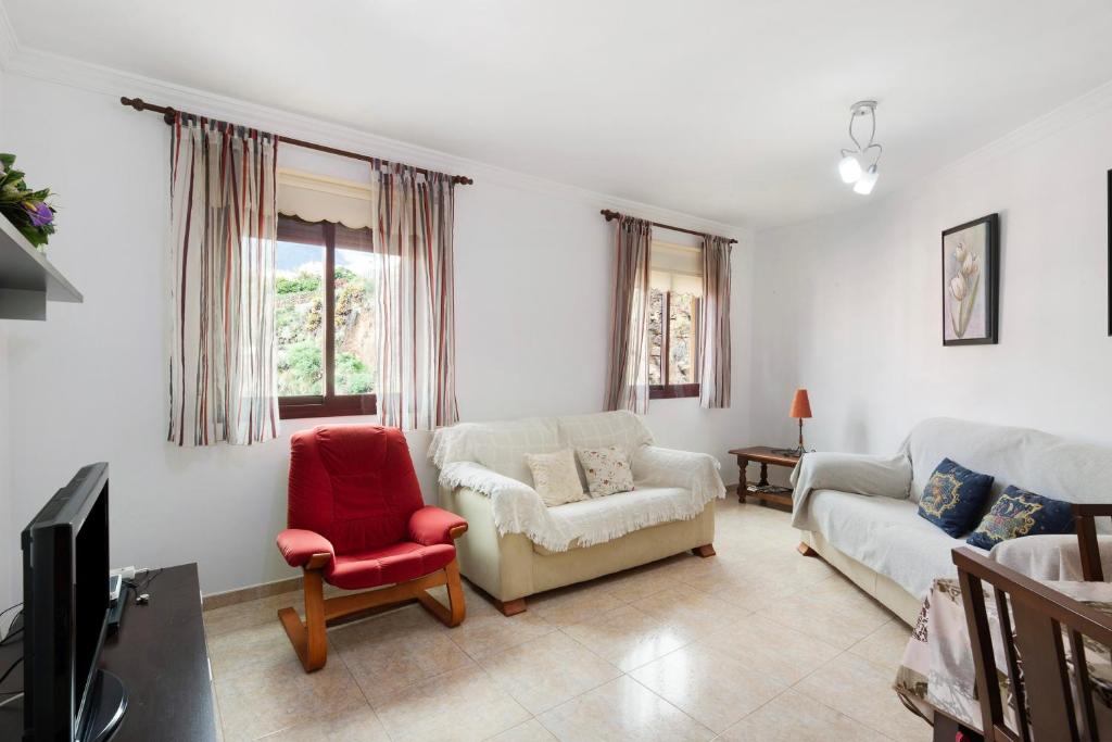 TV a/nebo společenská místnost v ubytování Los Girasoles