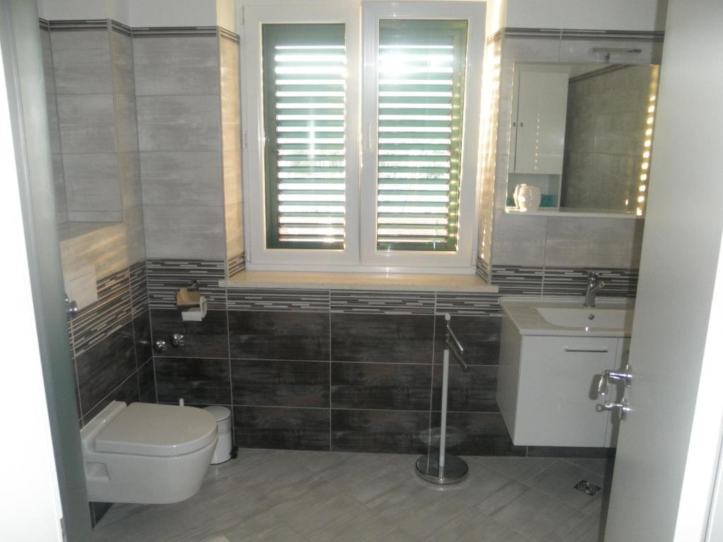 Koupelna v ubytování Rooms Carija