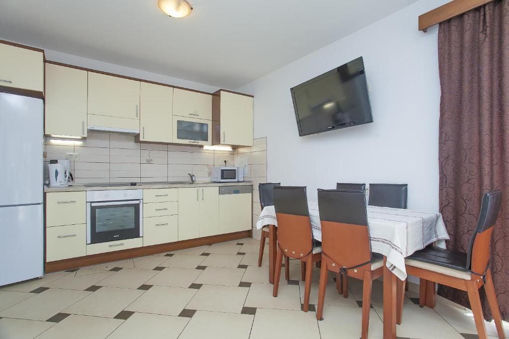 Kuchyň nebo kuchyňský kout v ubytování Apartments Villa Maris