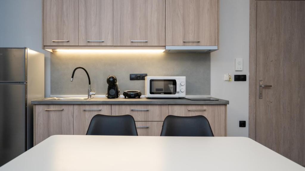 Kuchyň nebo kuchyňský kout v ubytování Tsikaris Boutique Guesthouse