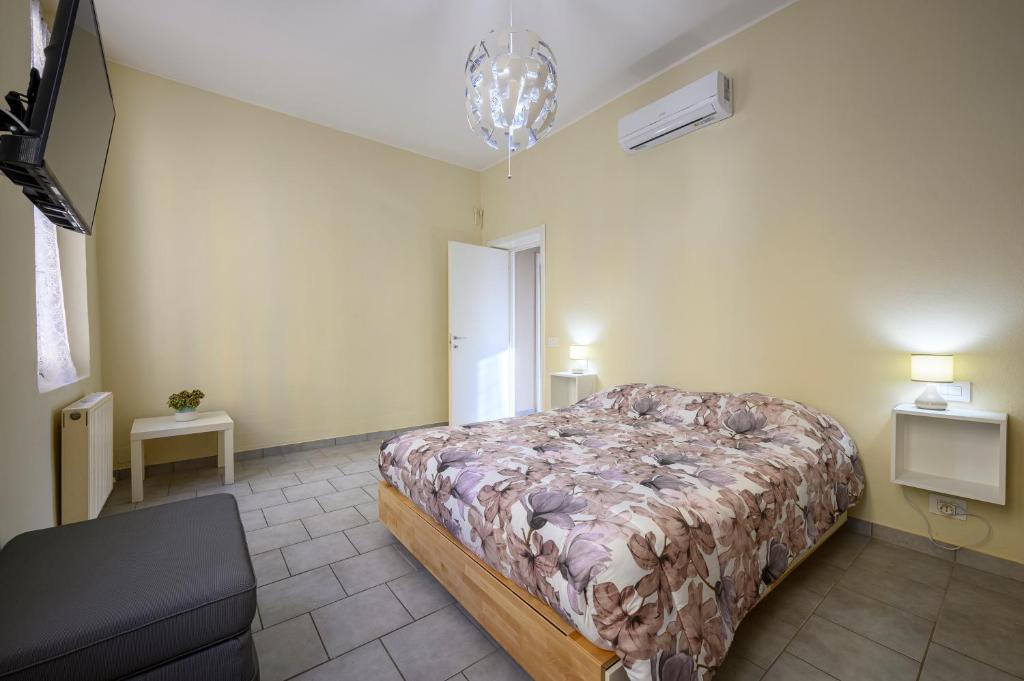 Ένα ή περισσότερα κρεβάτια σε δωμάτιο στο La casa del Sole