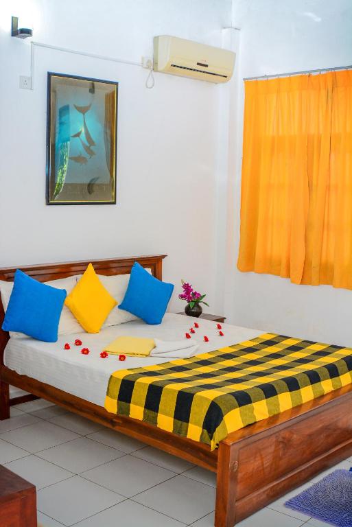 Postel nebo postele na pokoji v ubytování SAKURAHANA VILLA AND AYURVEDA