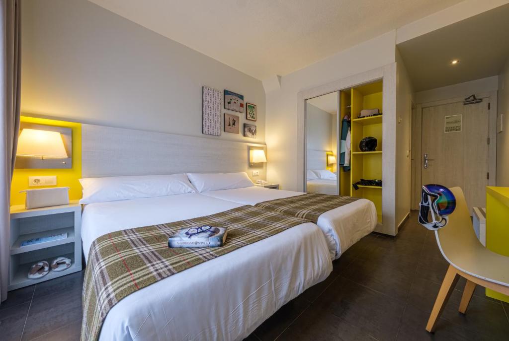 Voodi või voodid majutusasutuse Hotel Cristina toas