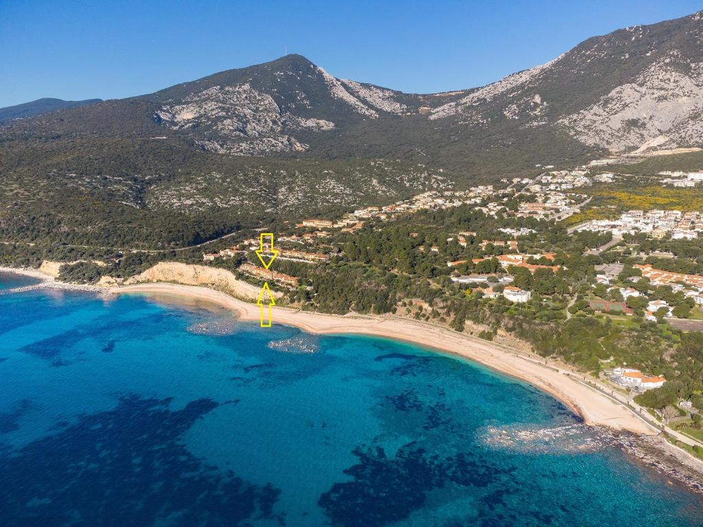 an aerial view of a beach and the ocean at casa luisa in Cala Gonone