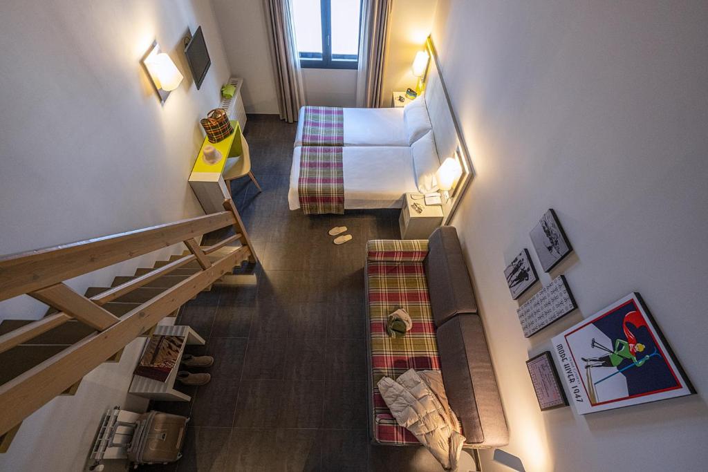 Voodi või voodid majutusasutuse Hotel Cristina toas