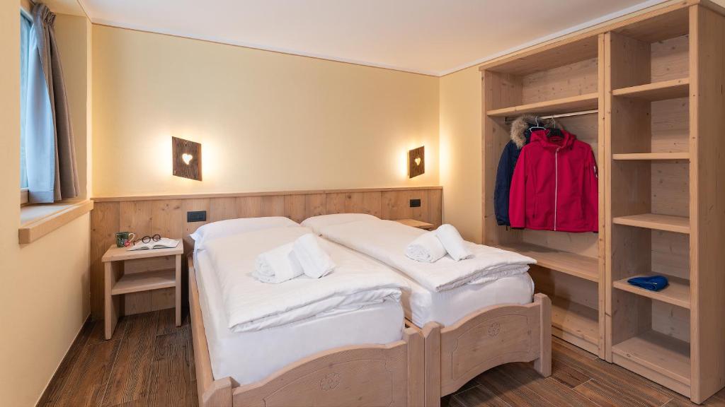 Кровать или кровати в номере Chalet Li Mina