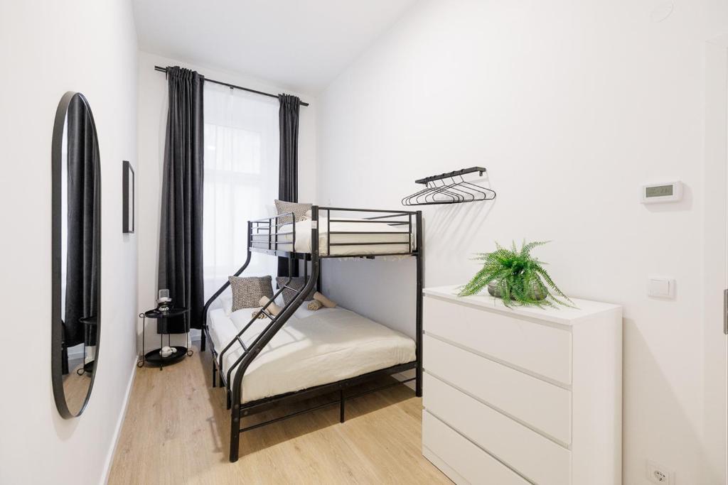 Postel nebo postele na pokoji v ubytování Central City Style Rooms by Home2