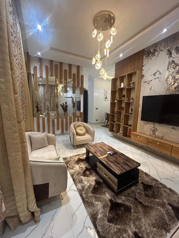 Posezení v ubytování Exquisite 3 Bed