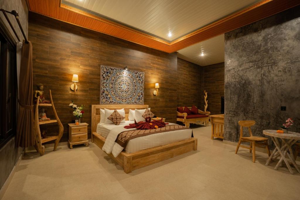 Postel nebo postele na pokoji v ubytování Ubud Paras Villa