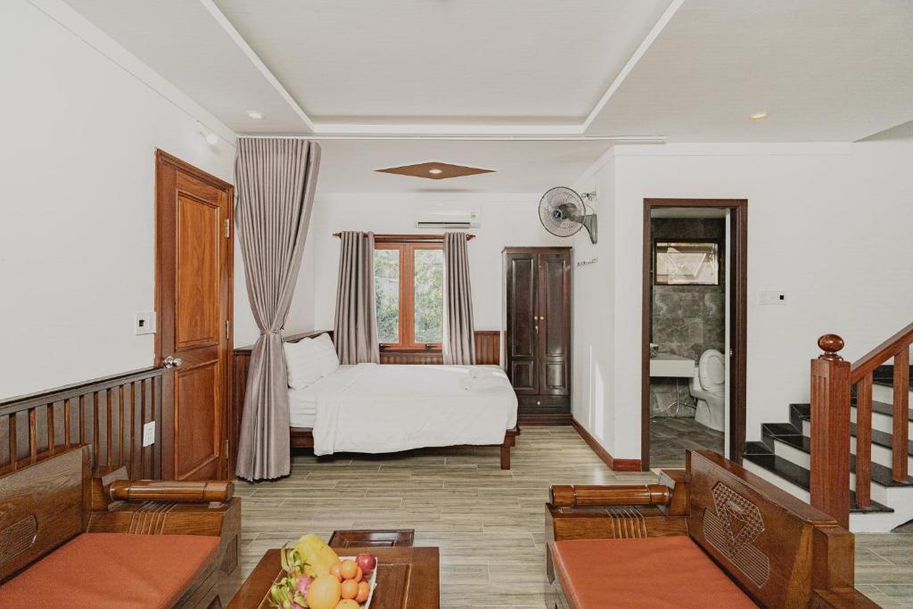 Giường trong phòng chung tại Valentina Resort & Spa Phu Quoc