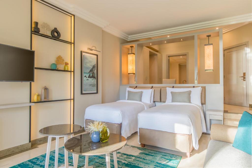 Postel nebo postele na pokoji v ubytování InterContinental Mauritius Resort Balaclava Fort by IHG