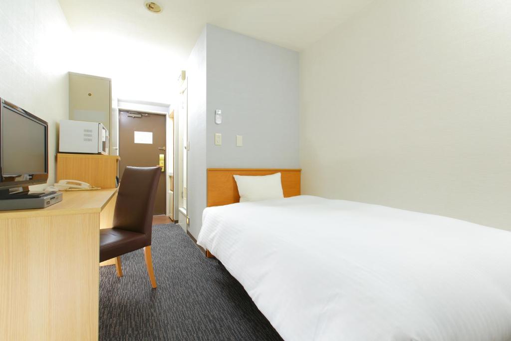 TV a/nebo společenská místnost v ubytování HOTEL MYSTAYS Kameido
