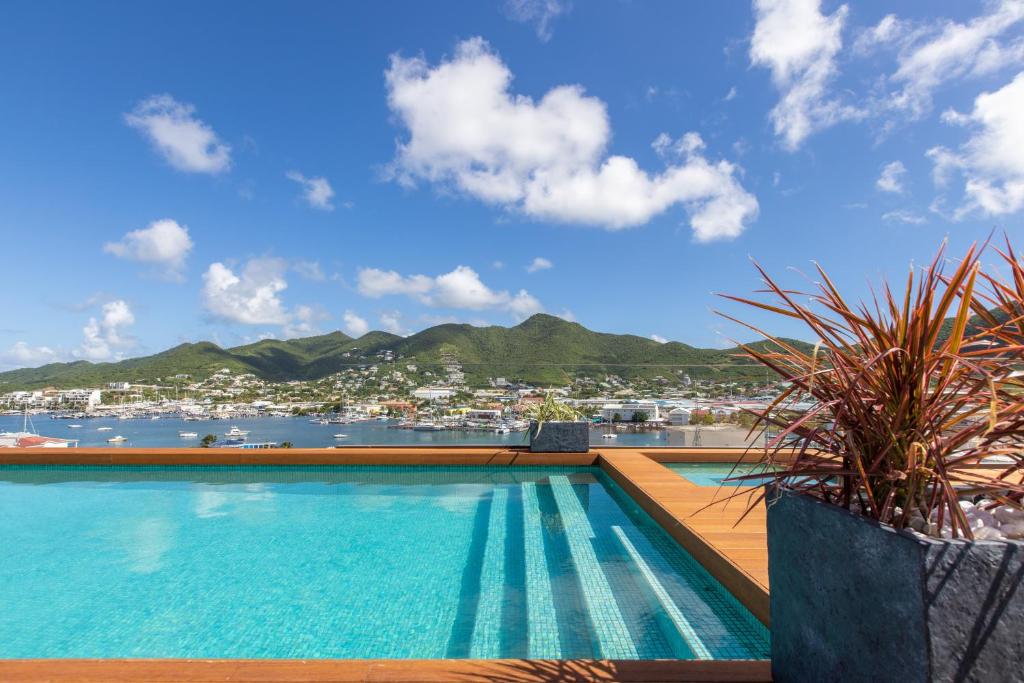a swimming pool on the roof of a building at The Hills Residence in Simpson Bay