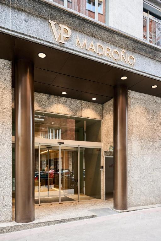 a store front of a building with a sign on it at VP Madroño in Madrid