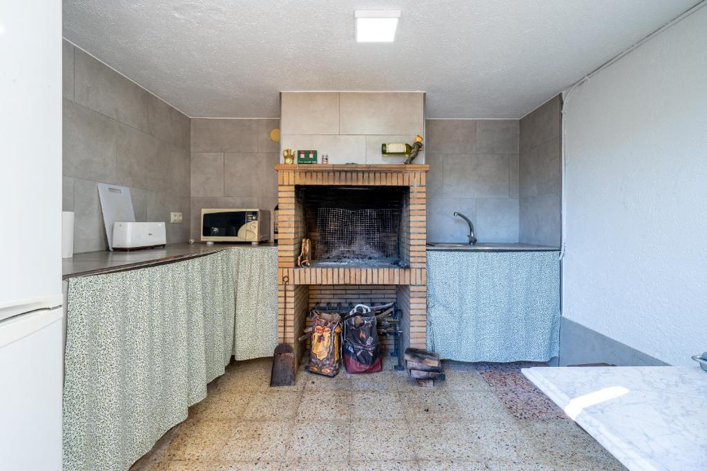 Kuchyň nebo kuchyňský kout v ubytování Hauzify I Casa Selvabrava