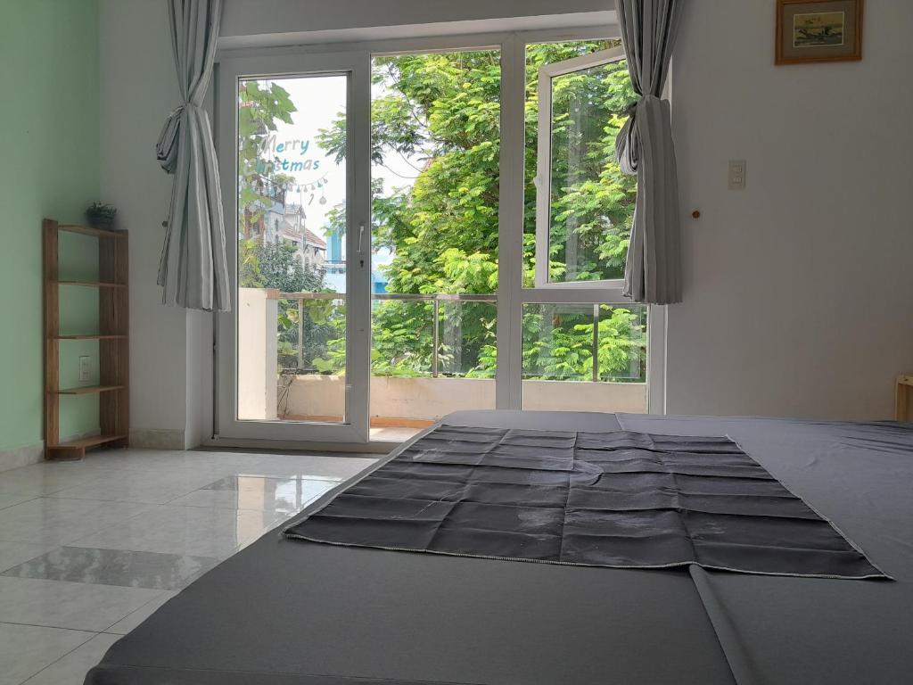 Postel nebo postele na pokoji v ubytování QV Home