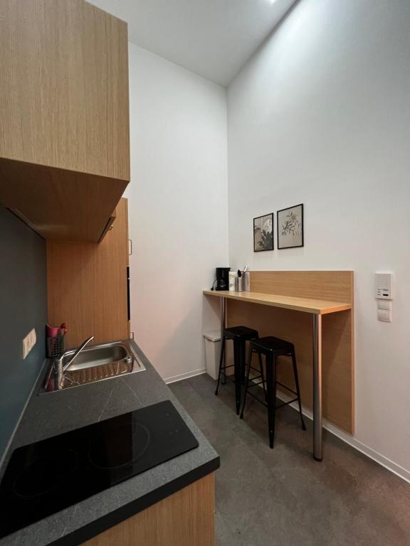Kuchyň nebo kuchyňský kout v ubytování Fabella Flats Forchheim