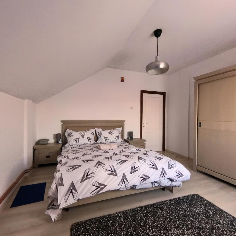 Postel nebo postele na pokoji v ubytování Casa Reds