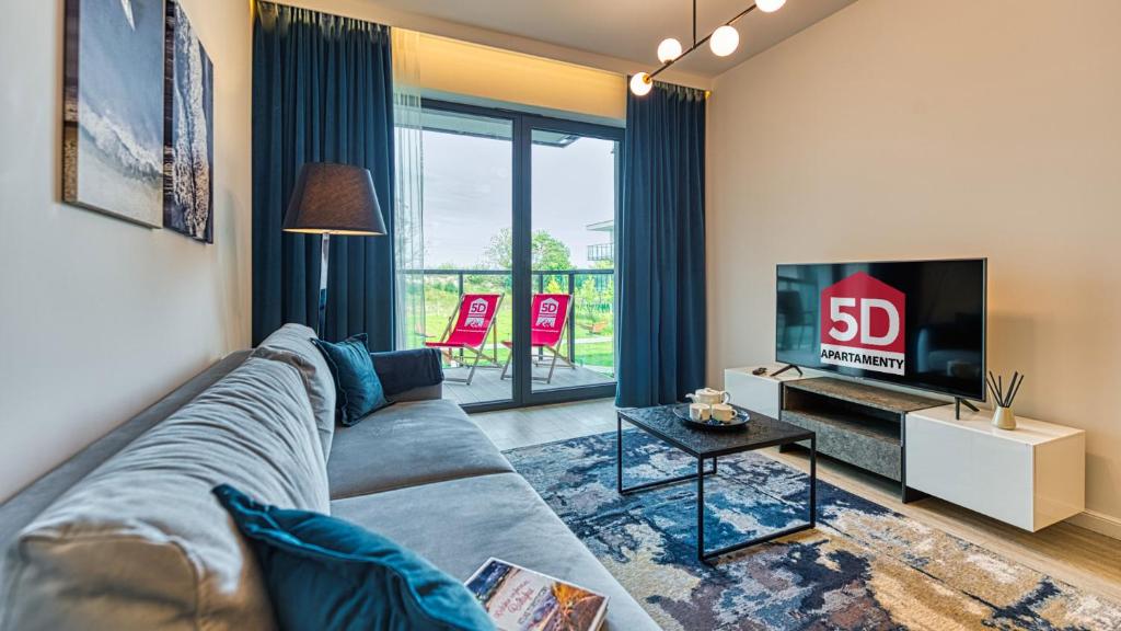 TV a/nebo společenská místnost v ubytování Rezydencja Niechorze 213 - 5D Apartamenty